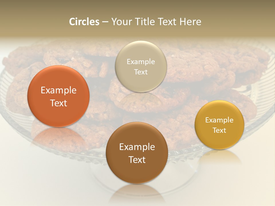 A Glass Plate Filled With Cookies On Top Of A Table PowerPoint Template