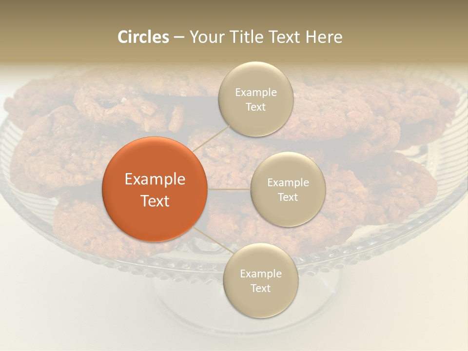 A Glass Plate Filled With Cookies On Top Of A Table PowerPoint Template