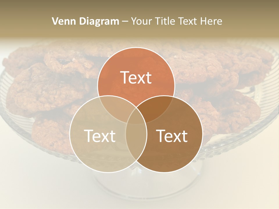 A Glass Plate Filled With Cookies On Top Of A Table PowerPoint Template