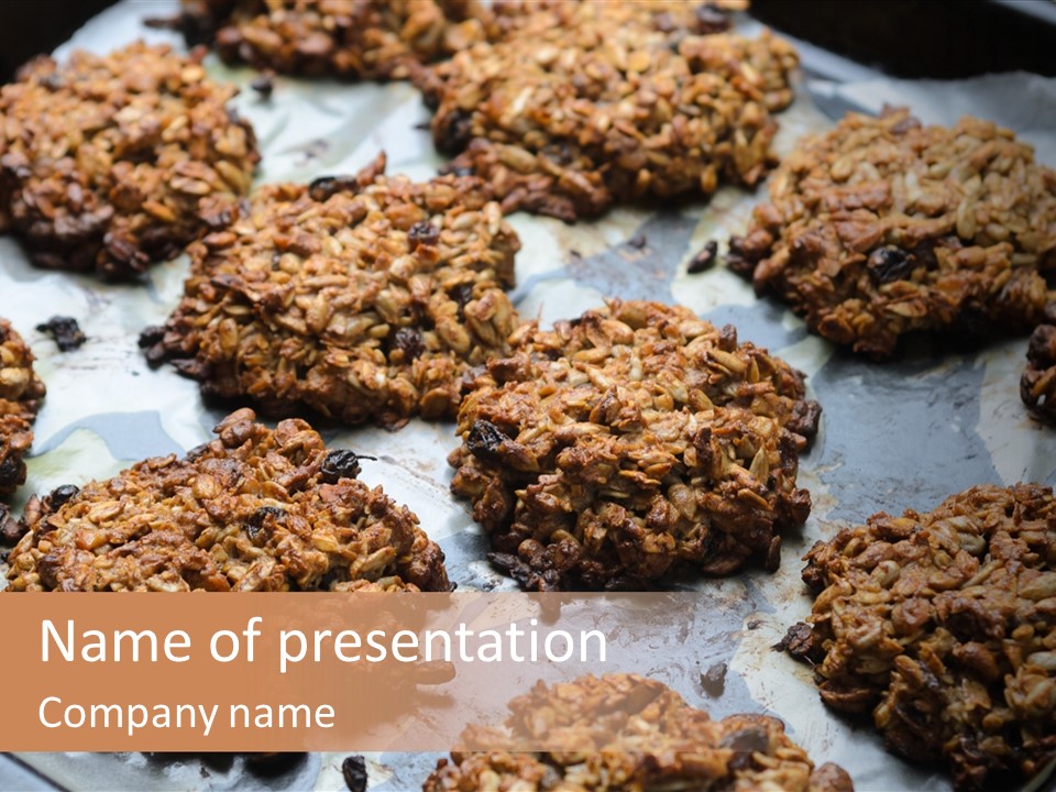 A Bunch Of Cookies That Are On A Pan PowerPoint Template