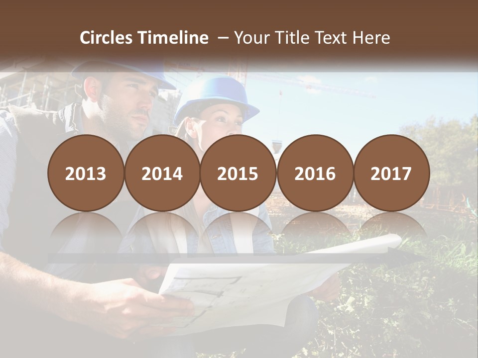 A Man And A Woman In Hardhats Looking At A Blueprint PowerPoint Template