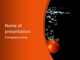 A Tomato Is Floating In The Water On A Black Background PowerPoint Template