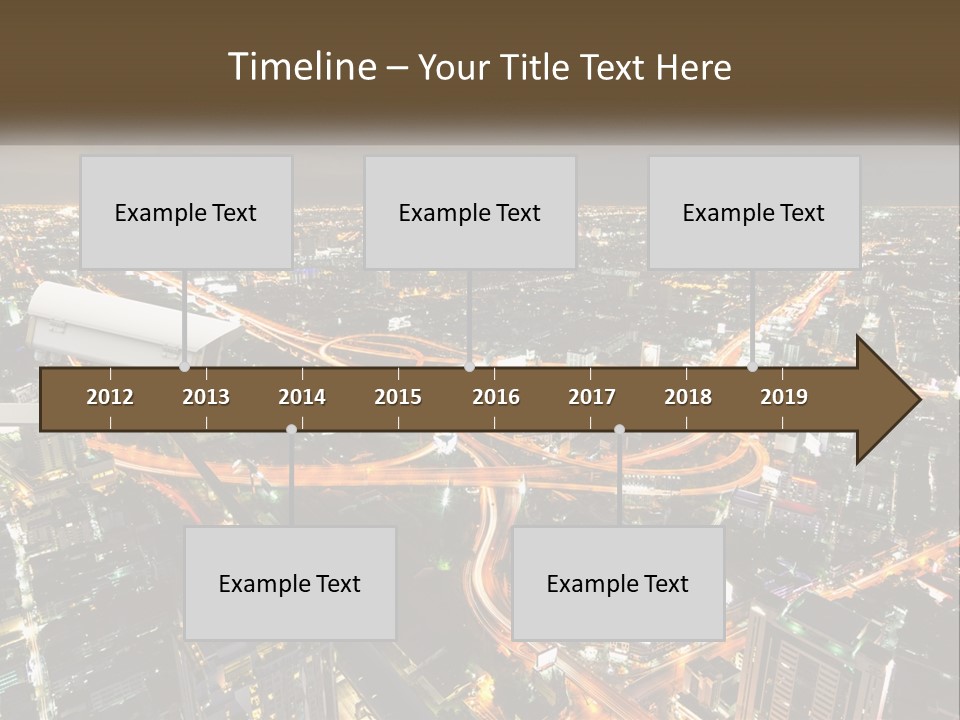 An Aerial View Of A City At Night PowerPoint Template