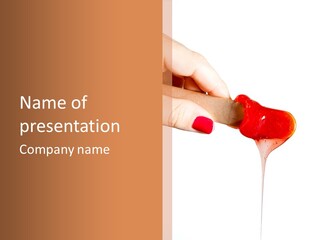 A Woman Is Holding A Spoon With A Red Substance On It PowerPoint Template