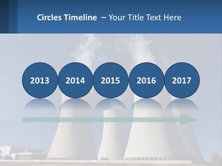 A Power Plant With Smoke Coming Out Of It PowerPoint Template