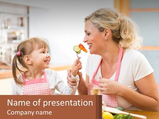A Woman And A Little Girl Eating Vegetables PowerPoint Template
