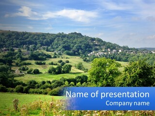 A Blue Sign Is In The Middle Of A Field PowerPoint Template