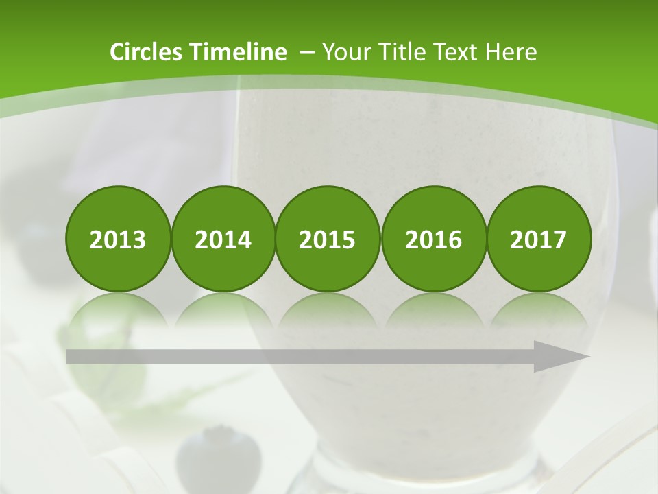 A Glass Filled With A Smoothie Next To Blueberries PowerPoint Template