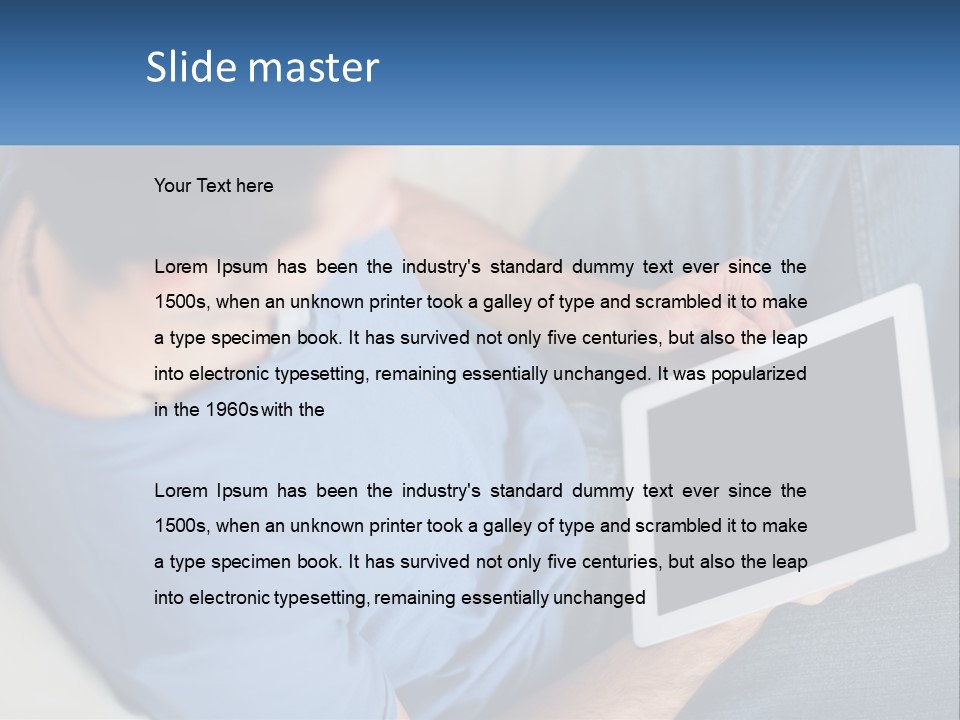 A Man Sitting On A Couch Holding A Tablet PowerPoint Template