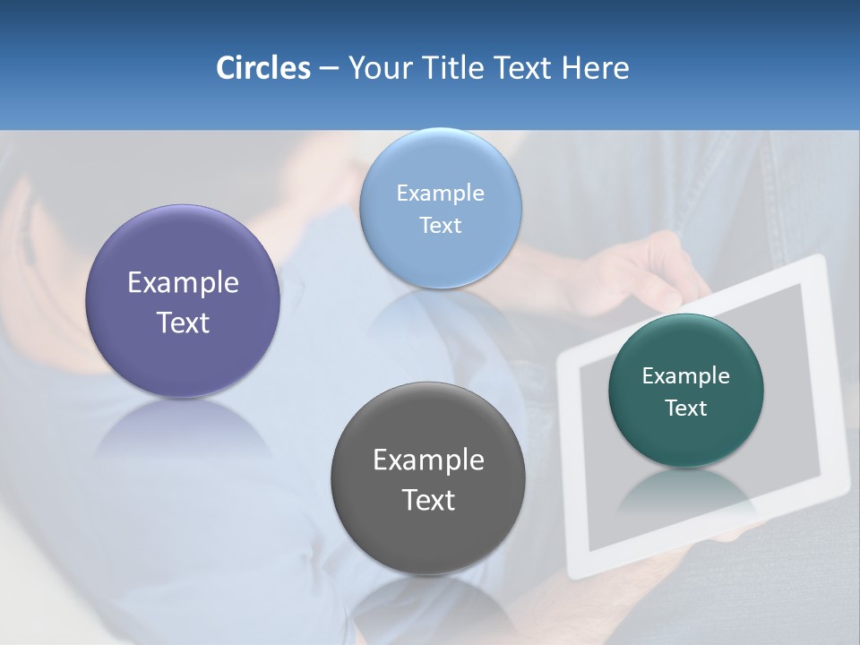 A Man Sitting On A Couch Holding A Tablet PowerPoint Template