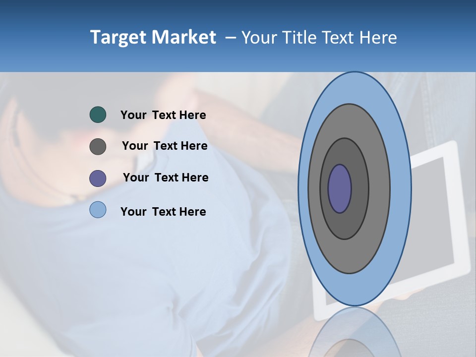 A Man Sitting On A Couch Holding A Tablet PowerPoint Template