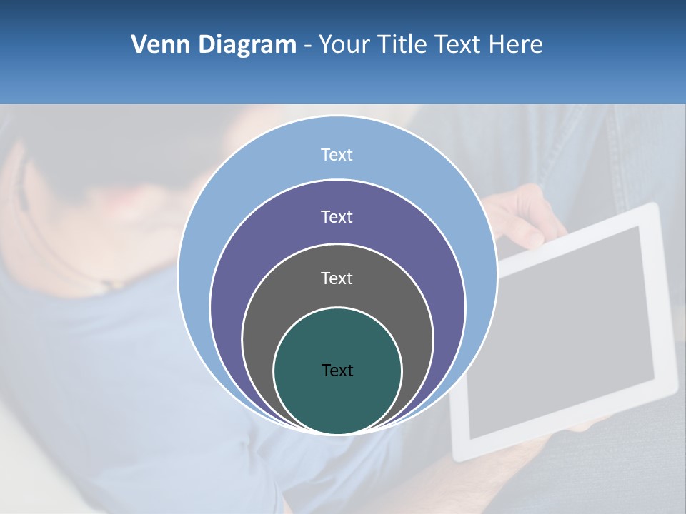 A Man Sitting On A Couch Holding A Tablet PowerPoint Template