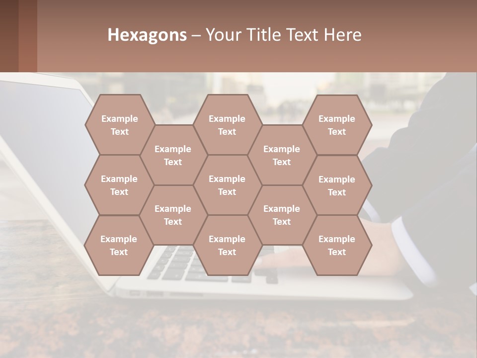 A Person Typing On A Laptop On A Table PowerPoint Template