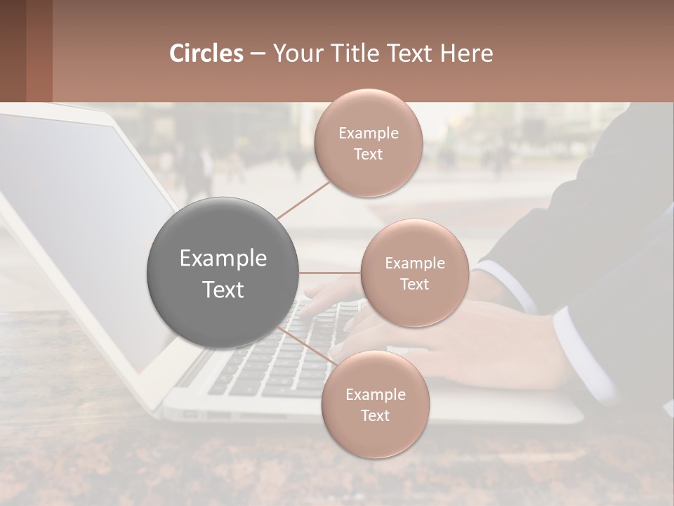 A Person Typing On A Laptop On A Table PowerPoint Template