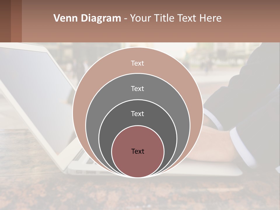 A Person Typing On A Laptop On A Table PowerPoint Template