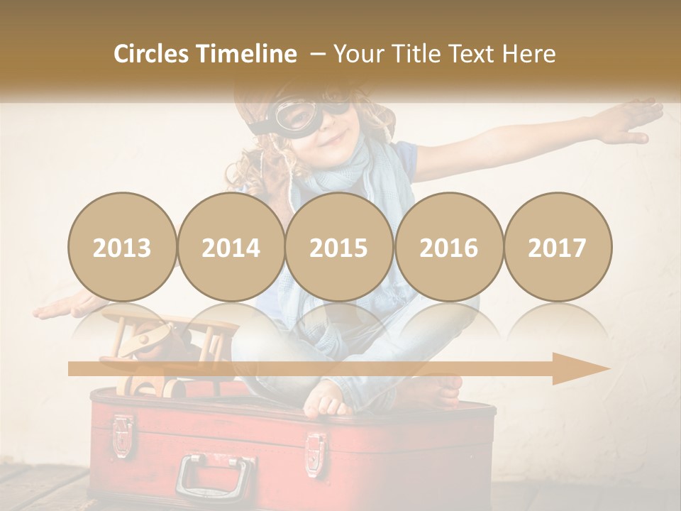 A Little Girl Sitting On Top Of A Red Suitcase PowerPoint Template