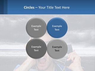 A Man Holding A Cell Phone Up To His Face PowerPoint Template