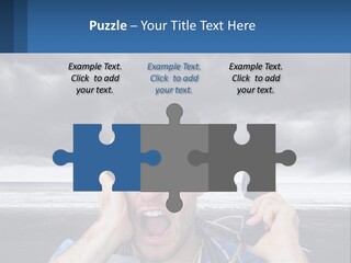 A Man Holding A Cell Phone Up To His Face PowerPoint Template