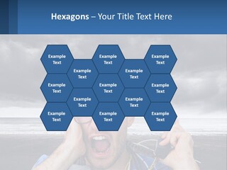 A Man Holding A Cell Phone Up To His Face PowerPoint Template