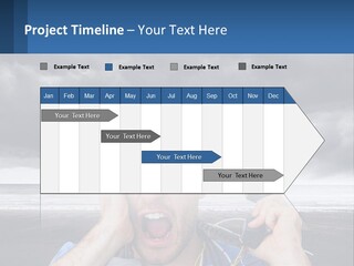 A Man Holding A Cell Phone Up To His Face PowerPoint Template