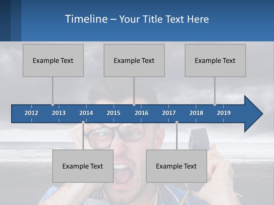 A Man Holding A Cell Phone Up To His Face PowerPoint Template