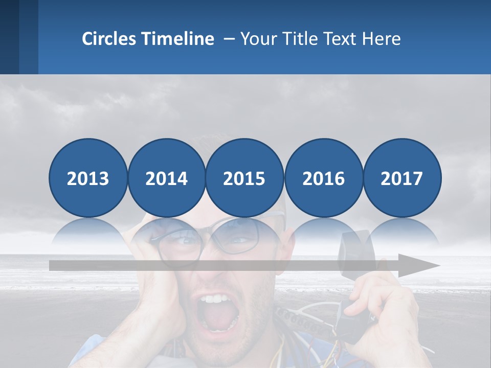 A Man Holding A Cell Phone Up To His Face PowerPoint Template