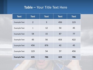 A Man Holding A Cell Phone Up To His Face PowerPoint Template