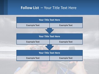 A Man Holding A Cell Phone Up To His Face PowerPoint Template