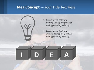 A Man Holding A Cell Phone Up To His Face PowerPoint Template