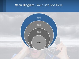 A Man Holding A Cell Phone Up To His Face PowerPoint Template