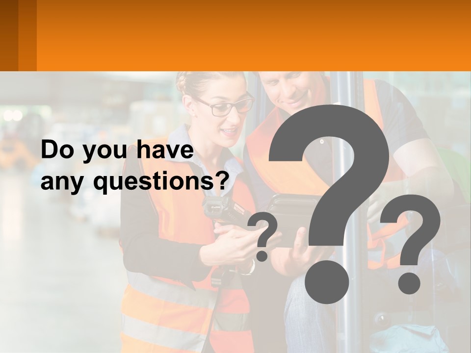 A Man And A Woman In Safety Vests Looking At A Tablet PowerPoint Template