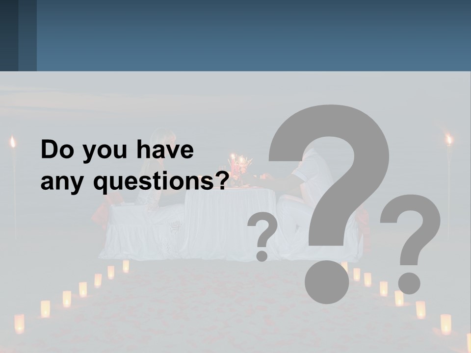 A Man And Woman Sitting At A Table On The Beach PowerPoint Template