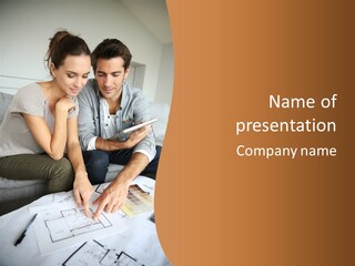 A Man And Woman Looking At Blueprints On A Table PowerPoint Template
