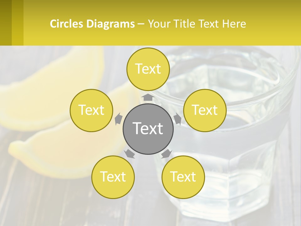 A Glass Of Water With Lemons On A Wooden Table PowerPoint Template
