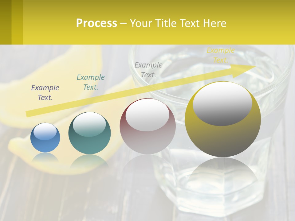A Glass Of Water With Lemons On A Wooden Table PowerPoint Template
