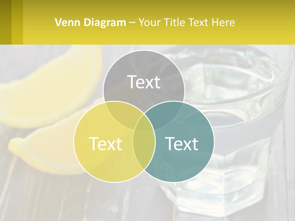 A Glass Of Water With Lemons On A Wooden Table PowerPoint Template
