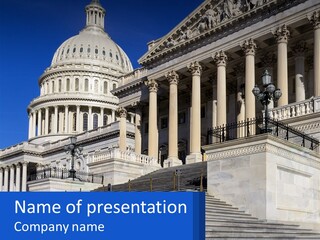 A Picture Of The Capitol Building In Washington D C PowerPoint Template