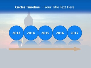 A Buddha Statue With The Sun Setting In The Background PowerPoint Template