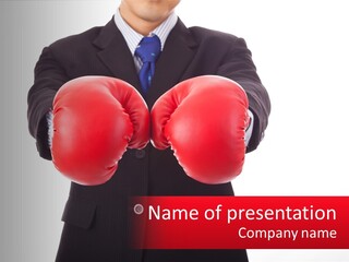A Man In A Suit And Tie Wearing Red Boxing Gloves PowerPoint Template