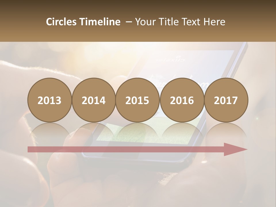 A Person Holding A Cell Phone In Their Hands PowerPoint Template