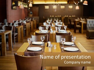 A Restaurant With Tables And Chairs With Place Settings PowerPoint Template