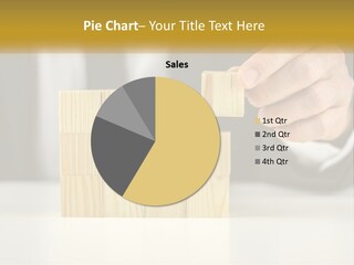 A Business Man Stacking Wooden Blocks On Top Of A Table PowerPoint Template