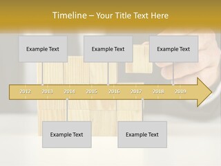 A Business Man Stacking Wooden Blocks On Top Of A Table PowerPoint Template