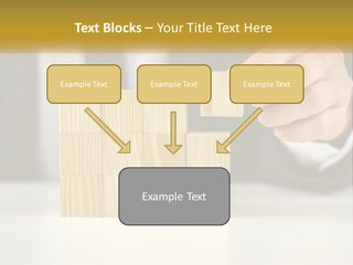 A Business Man Stacking Wooden Blocks On Top Of A Table PowerPoint Template