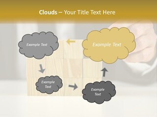 A Business Man Stacking Wooden Blocks On Top Of A Table PowerPoint Template