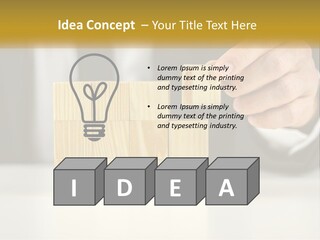 A Business Man Stacking Wooden Blocks On Top Of A Table PowerPoint Template