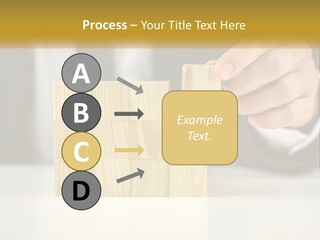A Business Man Stacking Wooden Blocks On Top Of A Table PowerPoint Template