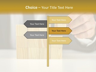 A Business Man Stacking Wooden Blocks On Top Of A Table PowerPoint Template