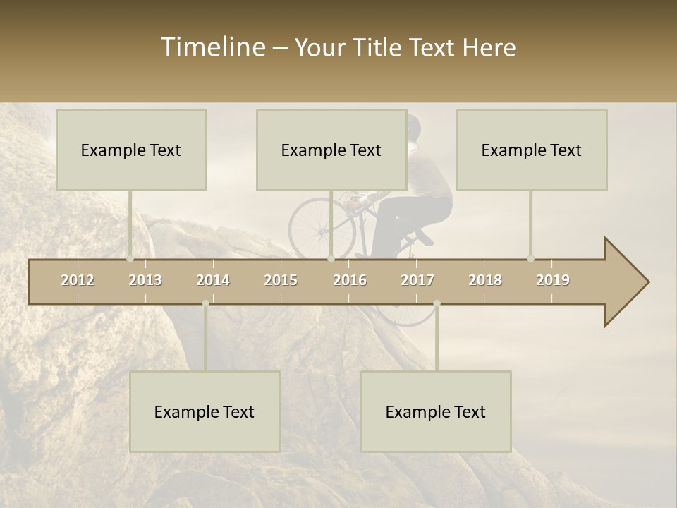 A Man Riding A Bike On Top Of A Mountain PowerPoint Template