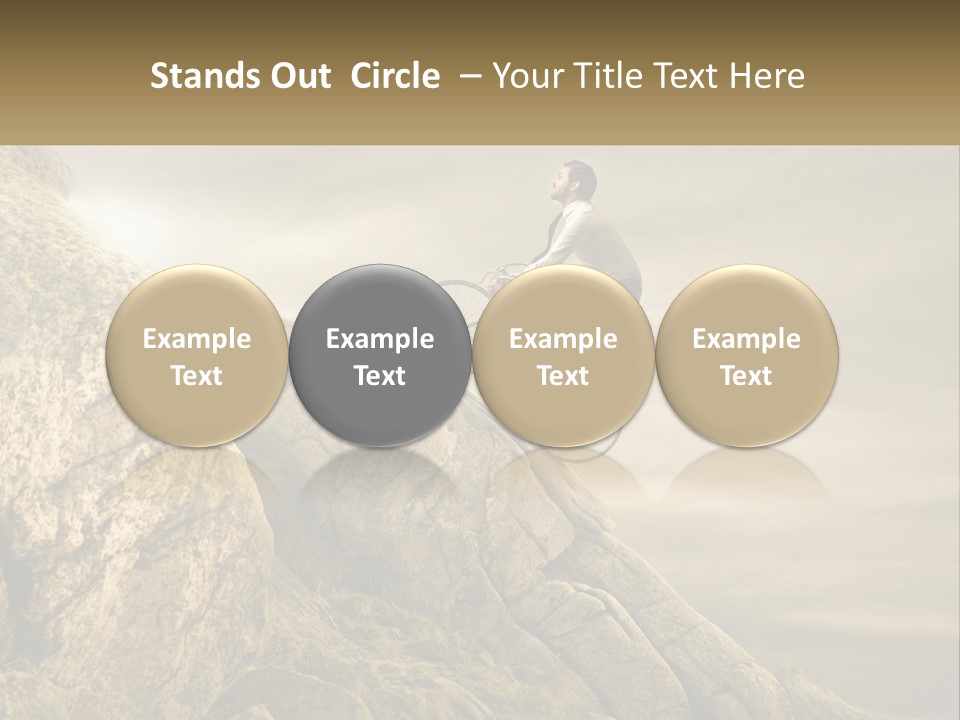 A Man Riding A Bike On Top Of A Mountain PowerPoint Template